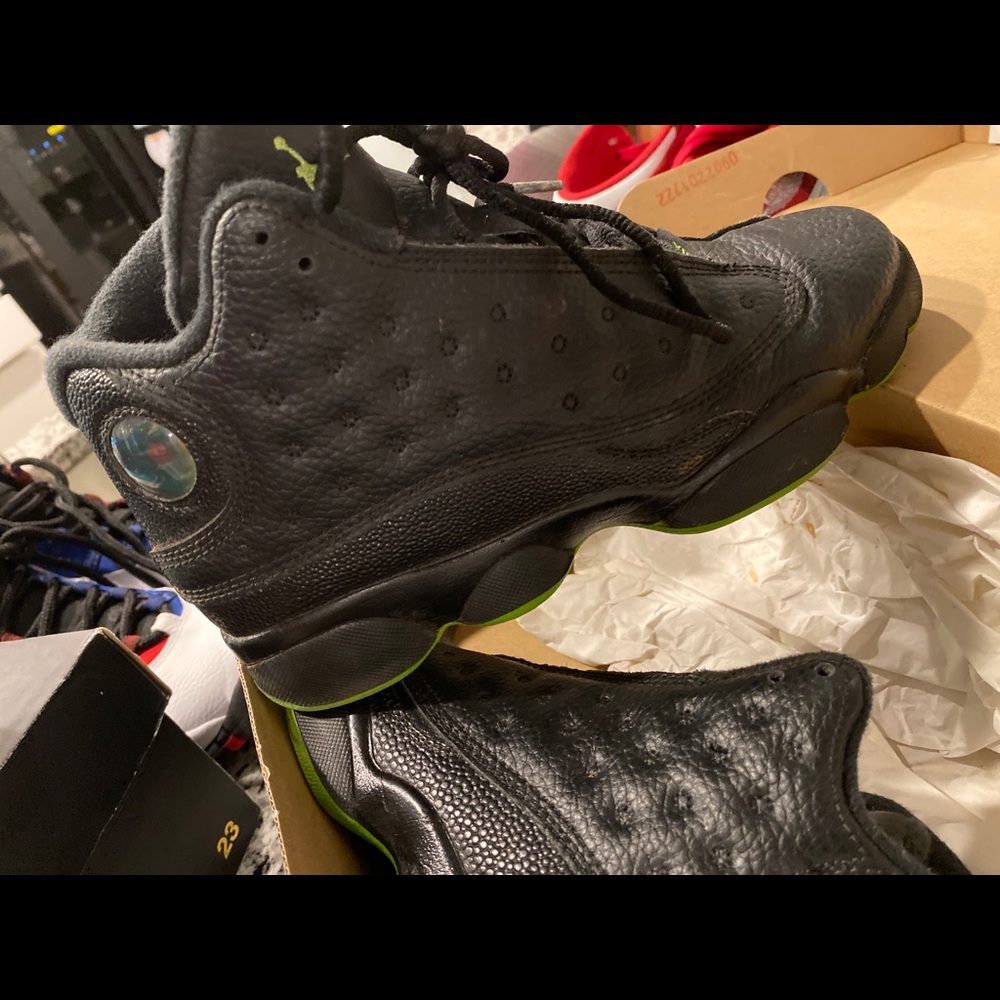 Black and green Jordan 13’s